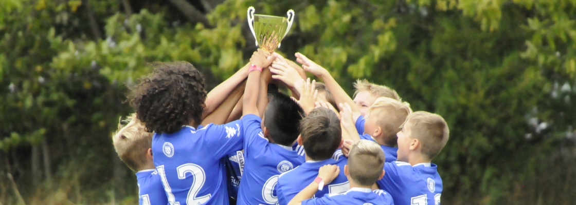 team raising the trophy